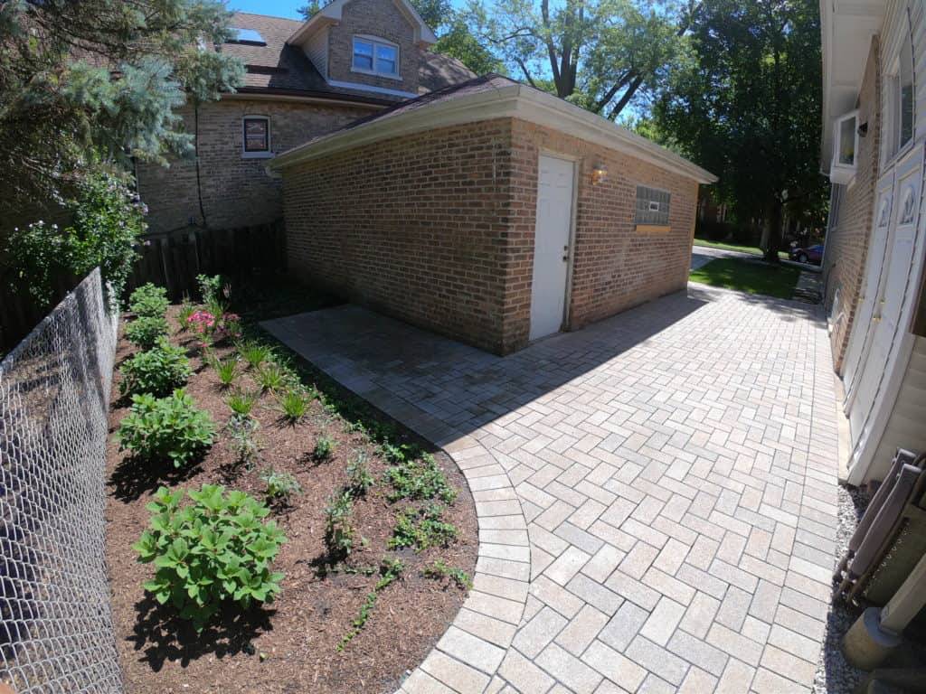 Herringbone paver walkway installed by Wave Outdoors